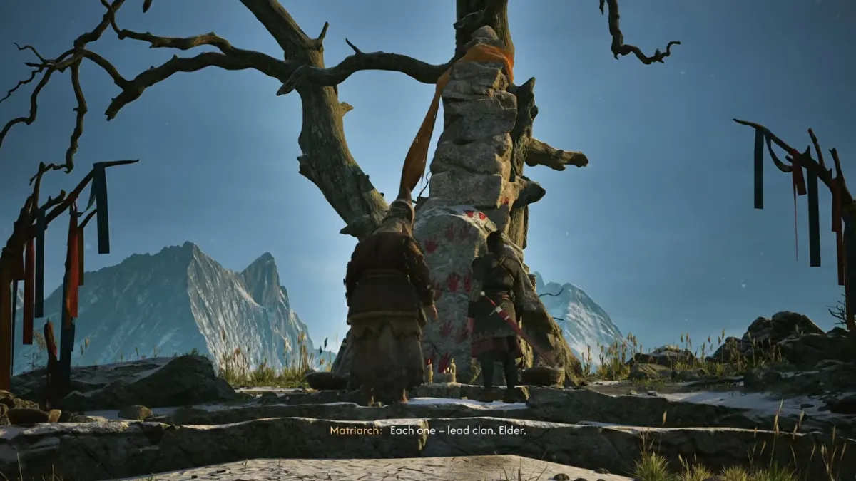 Two figures stand before a pale rock under a bare tree, with mountains behind; the subtitle reads Each one – lead clan. Elder.